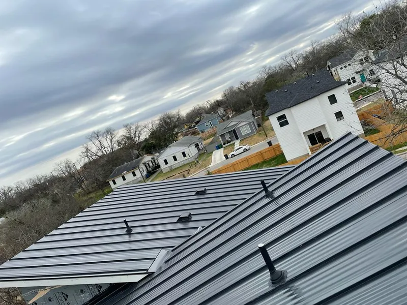 Standing seam metal roof panels with vents for Skylight Repair in Otsego